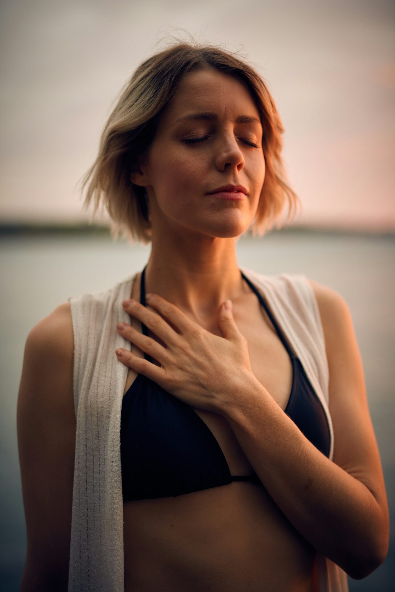 A person relaxing calmly in soft natural light